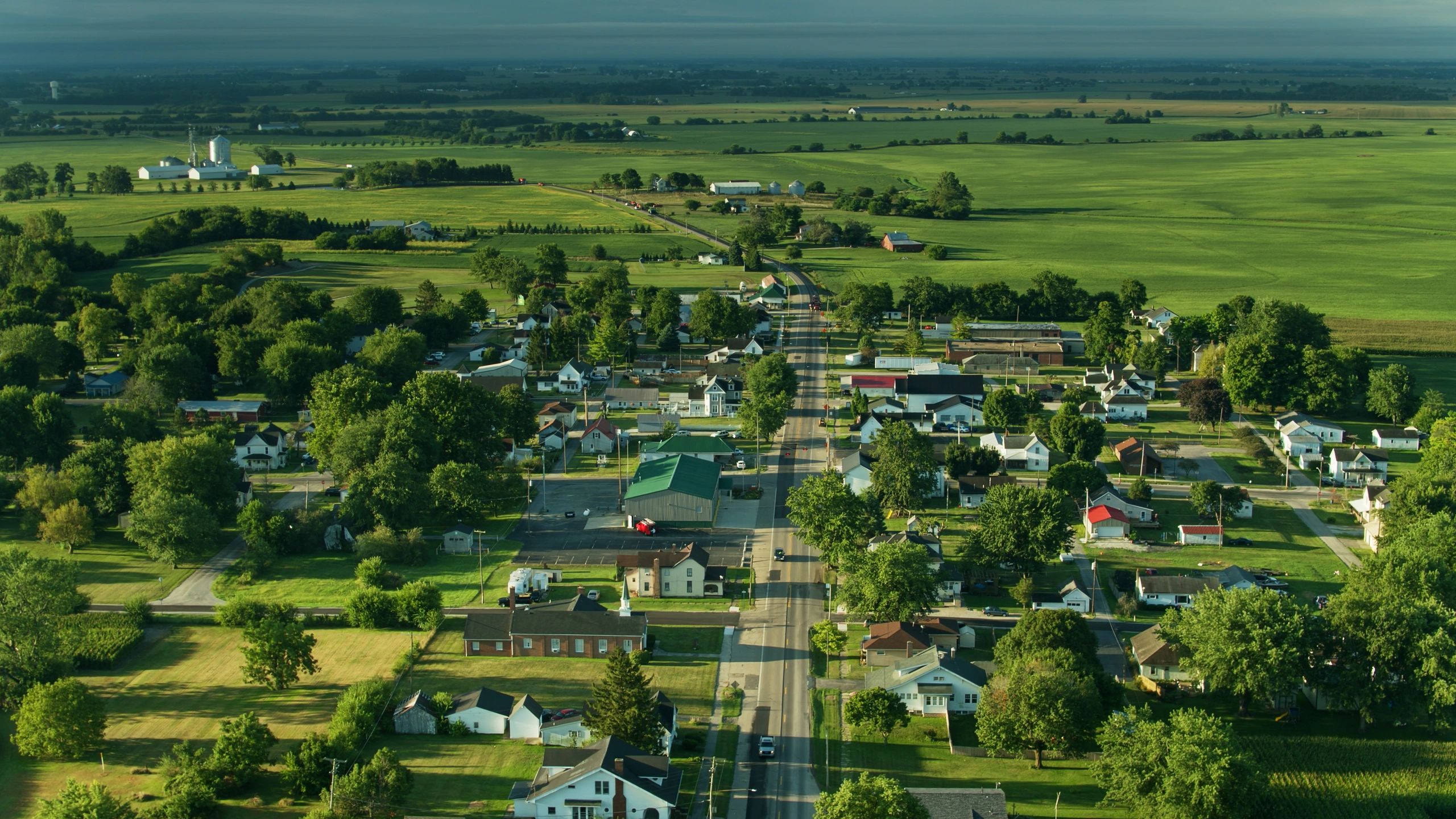 Aerial view of a small Midwest town connected by main road